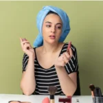 Woman with makeup products preventing melt in UAE heat