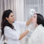 Dermatologist examining skin for UV issues in UAE